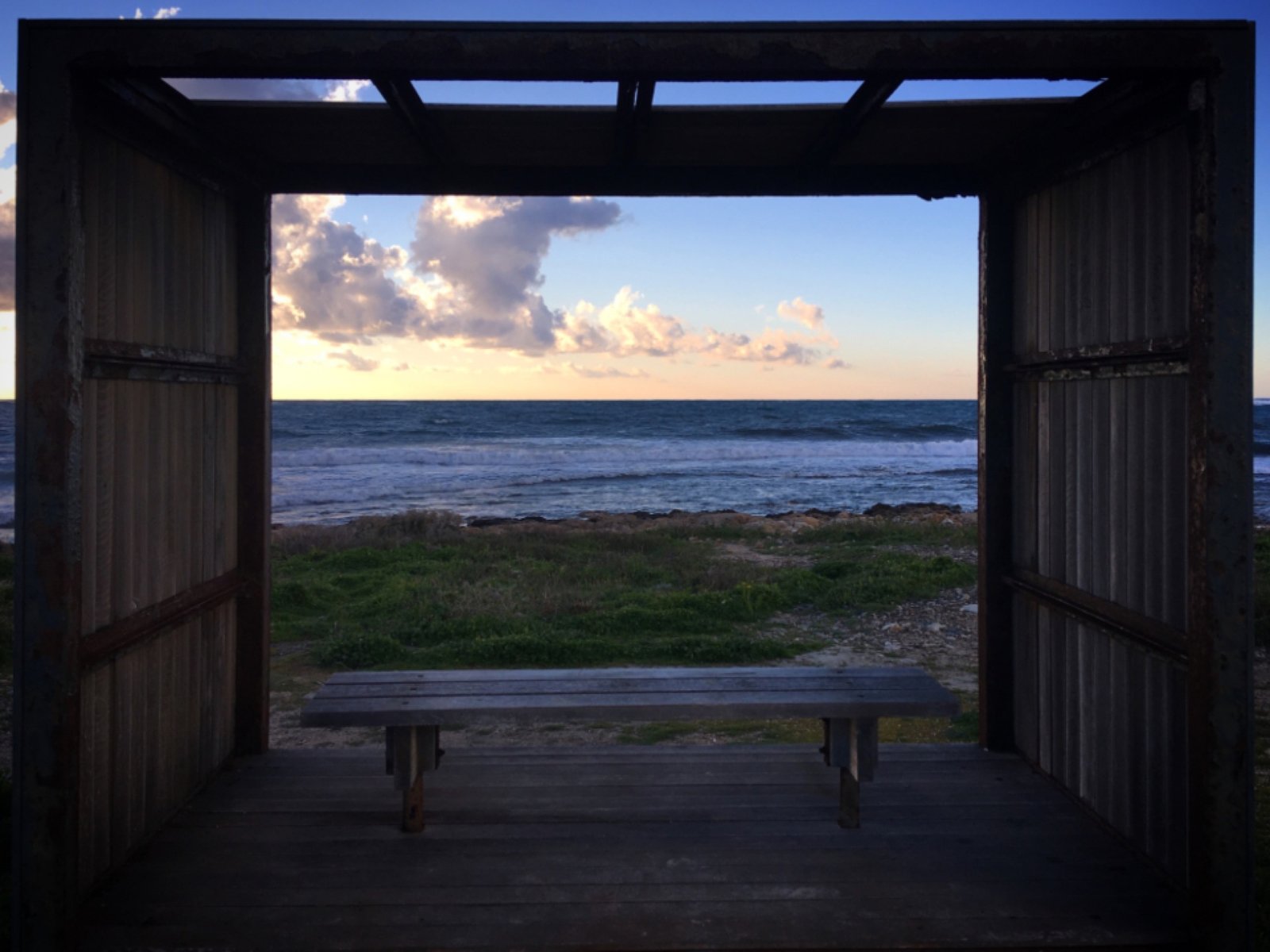 Sea view framed by a window opening